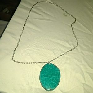 27" long chain with green stone pendant
